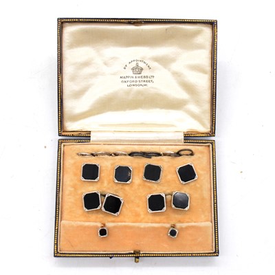 Lot 265 - A cased set of black onyx cufflinks and dress studs.