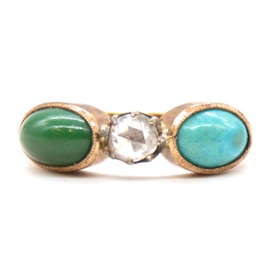 Lot 57 - A turquoise and diamond three stone ring.
