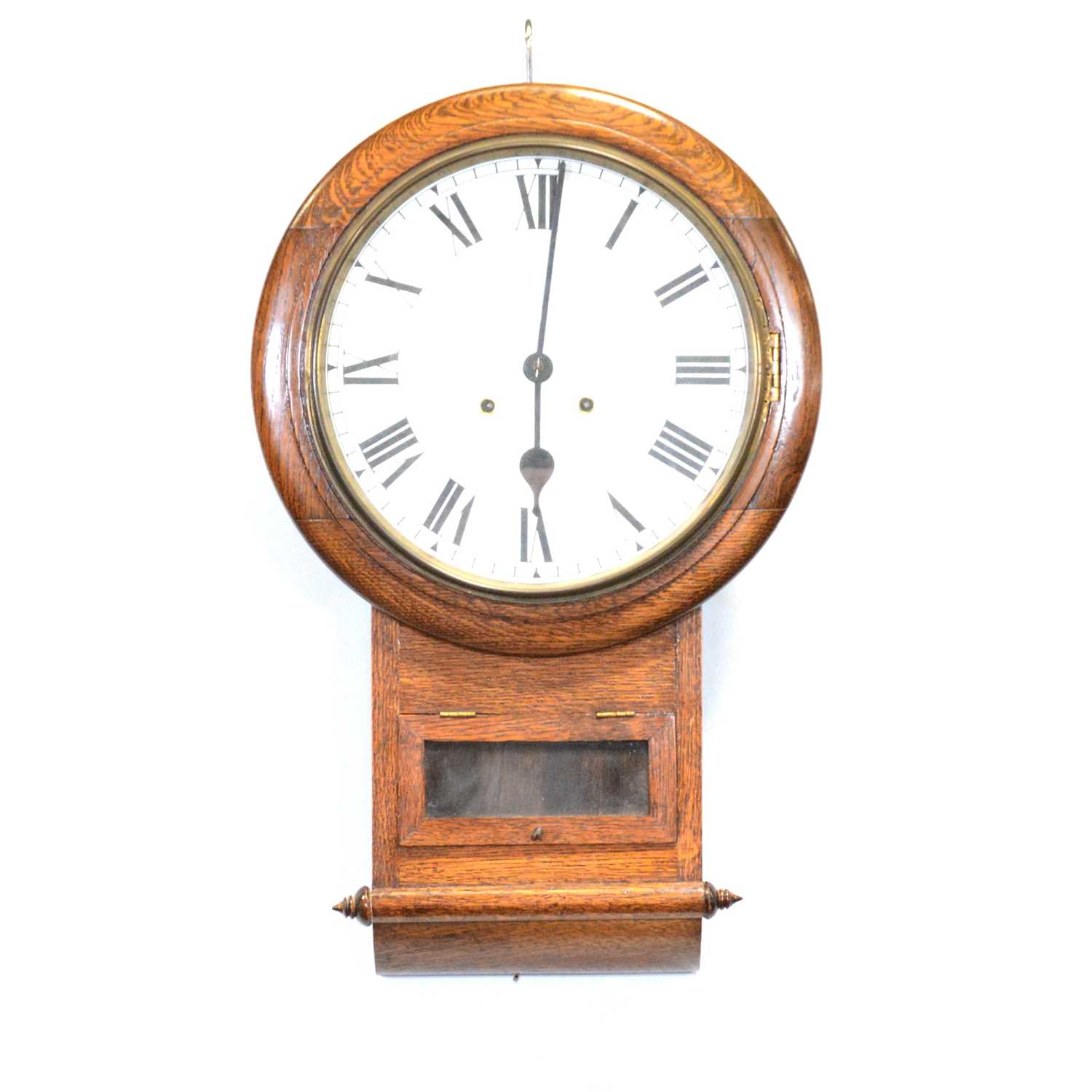Lot 558 - An oak cased wall clock.