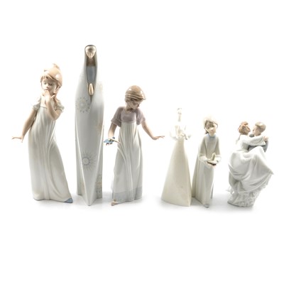 Lot 23 - A collection of Lladro, Nao and Doulton figurines.
