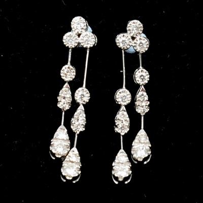 Lot 150 - A pair of modern negligee drop diamond earrings.