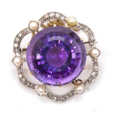 Lot 233 - An amethyst, diamond and pearl brooch.