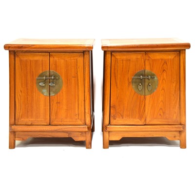 Lot 417 - Pair of Chinese hardwood wardrobes and a matching pair of bedside cupboards