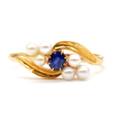 Lot 63 - A sapphire and pearl ring.