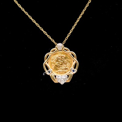 Lot 119 - A Gold Half Sovereign Coin Limited Edition Claddagh pendant