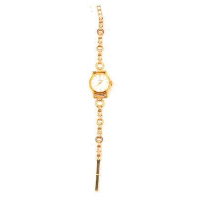 Lot 352 - Omega - a lady's gold-plated bracelet watch.