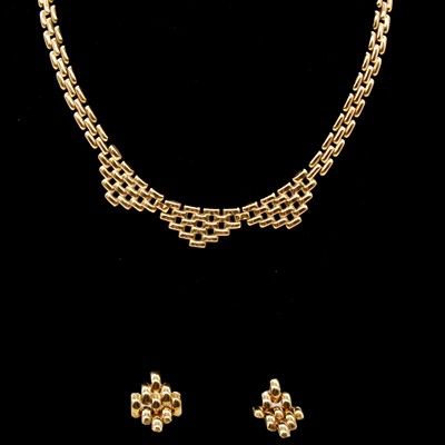 Lot 197 - A 9 carat yellow gold necklace and earring suite.