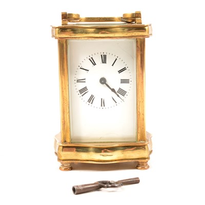 Lot 113 - French brass carriage clock, serpentine case