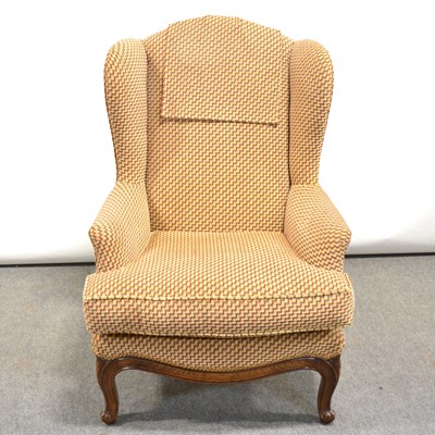 Lot 409 - French style wing-back easy chair