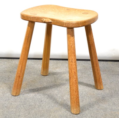 Lot 560 - Arts & Crafts oak saddle-seat stool, by Robert 'Mouseman' Thompson of Kilburn.