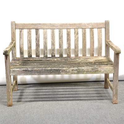 Lot 475 - Teak garden bench and two chairs