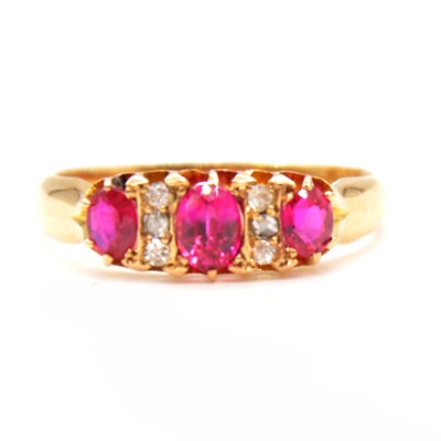 Lot 50 - A synthetic ruby and diamond half hoop ring.