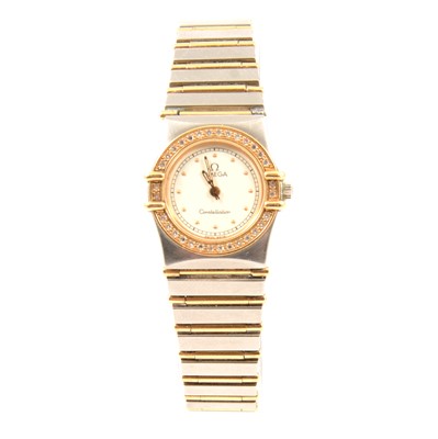 Lot 344 - Omega - a lady's Constellation diamond set two tone wristwatch.