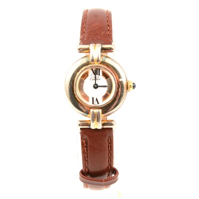 Lot 362 - Must de Cartier - a lady's gold-plated wristwatch.