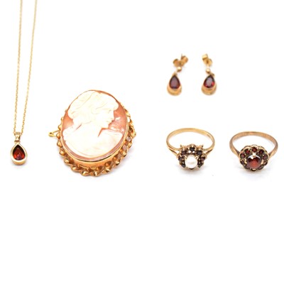 Lot 132 - A cameo brooch, suite of garnet jewellery and two rings.