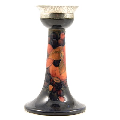 Lot 7 - William Moorcroft for Liberty & Co, a Pomegranate design candlestick