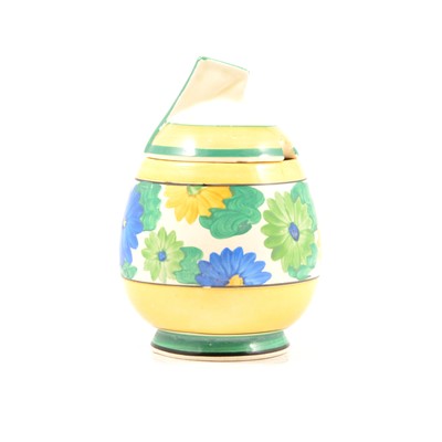 Lot 8 - A Clarice Cliff Sungay design preserve pot and cover in the Daffodil shape.
