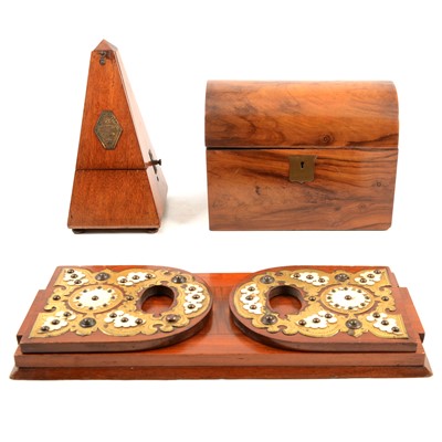 Lot 145 - Victorian adjustable bookrack, a casket-shaped box, and a metronome