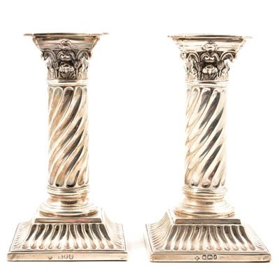 Lot 204 - A pair of silver candlesticks by Martin, Hall & Co (Richard Martin & Ebenezer Hall).