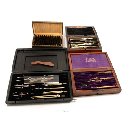 Lot 107 - Three boxes of drawing instruments, copper and brass measures, Art Deco knife rests