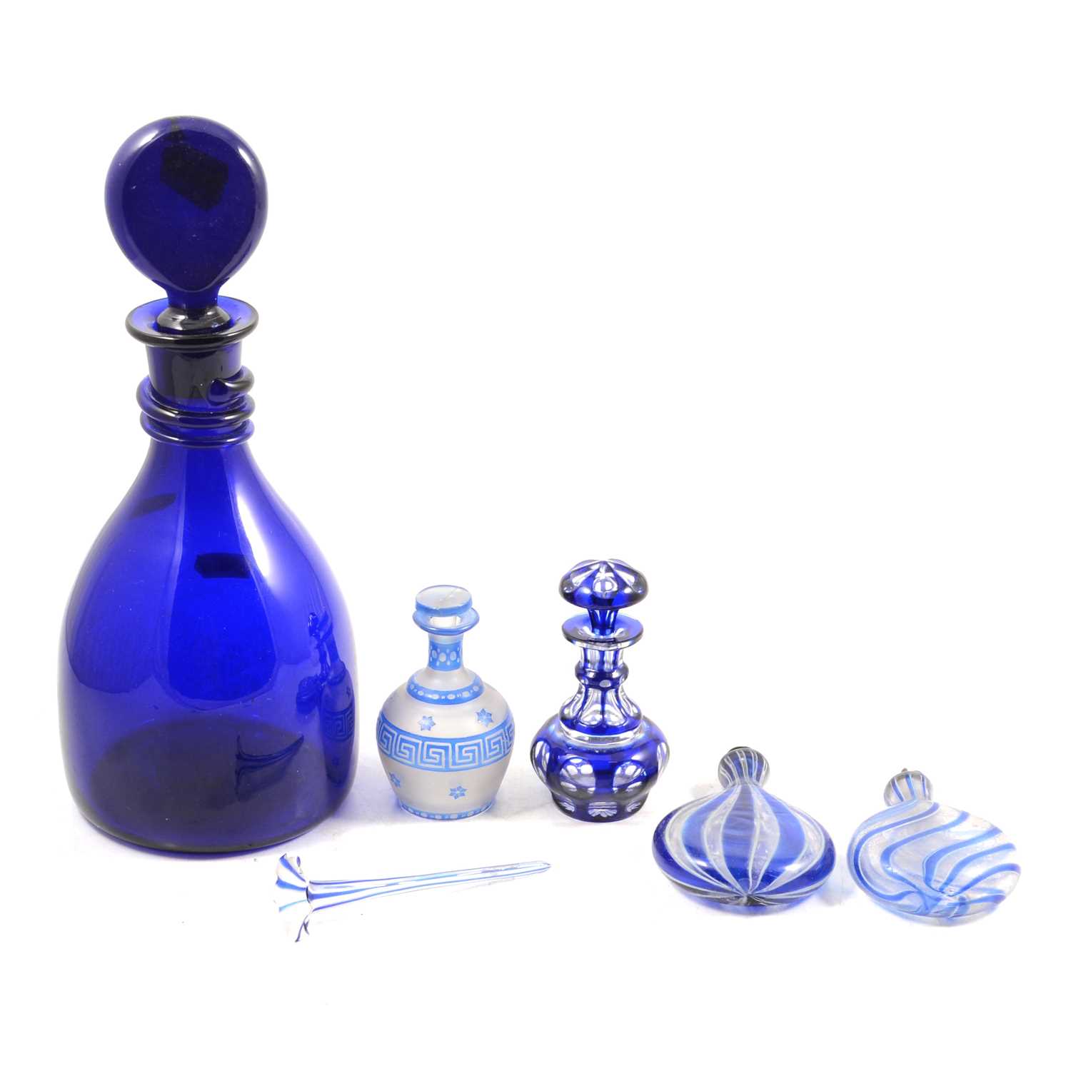 Lot 29 - Two Nailsea type flasks; bristol blue decanter; two other items of blue decorative glass.