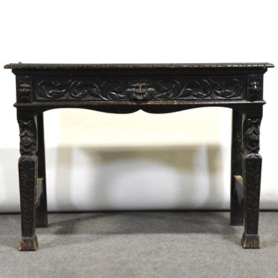 Lot 433 - Carved black oak hall table