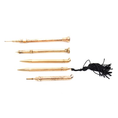 Lot 309 - Five 9 carat yellow gold and yellow metal pencils