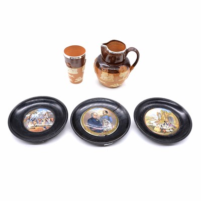 Lot 23 - Doulton stoneware jug and beaker with silver rims, three Prattware pot lids.