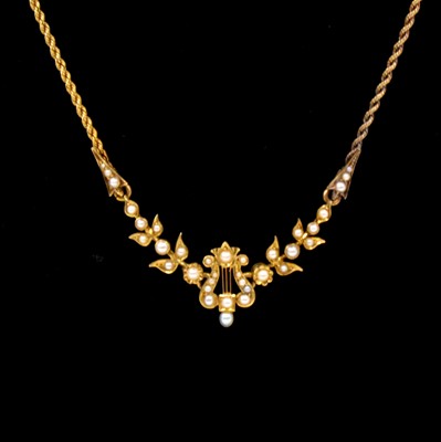 Lot 188 - A Victorian pearl and yellow metal necklace.