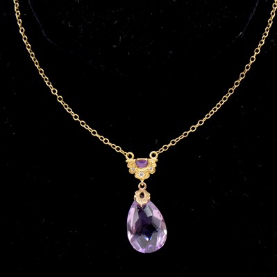 Lot 191 - An amethyst pendant and chain.