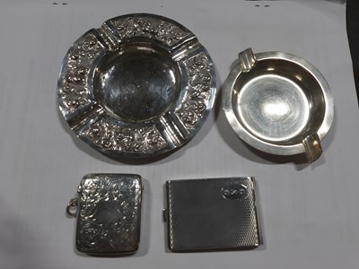 Lot 281 - A silver hatpin stand, vesta case, astray, book match case and embossed ashtray.