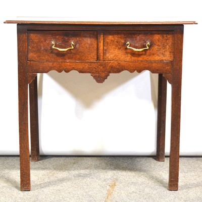 Lot 357 - George III oak lowboy