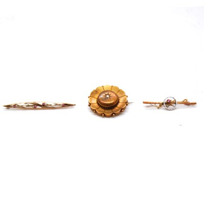 Lot 246 - Two bar brooches and a target brooch.