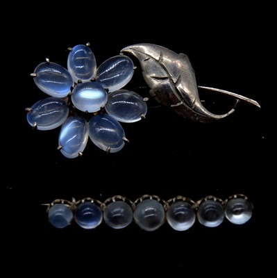 Lot 401 - Two moonstone brooches.