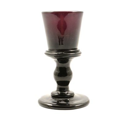 Lot 17 - An Amethyst coloured glass cordial glass