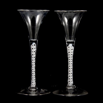 Lot 10 - A near pair of Georgian style opaque twist wine glasses