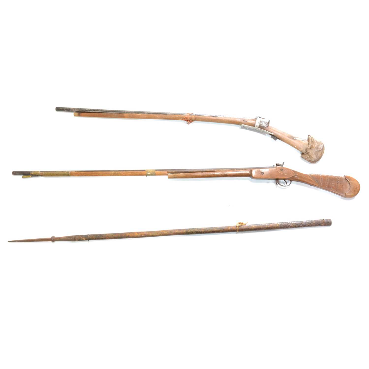 Lot 135 - Two Middle Eastern rifles and a iron-tipped spear