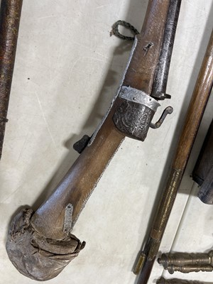 Lot 135 - Two Middle Eastern rifles and a iron-tipped spear