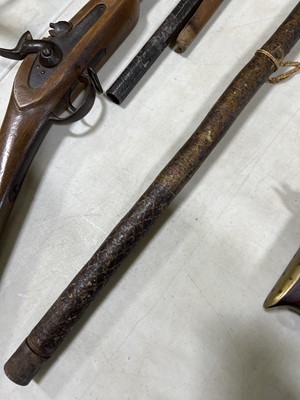 Lot 135 - Two Middle Eastern rifles and a iron-tipped spear