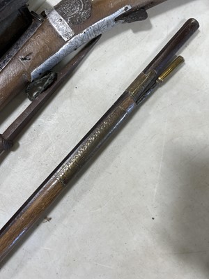 Lot 135 - Two Middle Eastern rifles and a iron-tipped spear