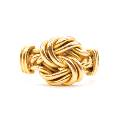 Lot 95 - A Victorian  18 carat yellow gold knot ring.