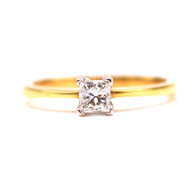 Lot 65 - A diamond solitaire ring.