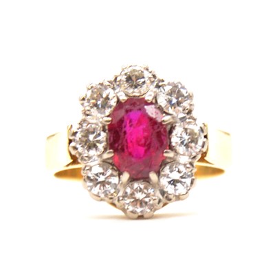 Lot 46 - CATALOGUE AMENDMENT - A ruby (synthetic ruby) and diamond cluster ring.