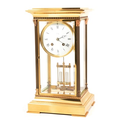 Lot 156 - Modern French lacquered brass four-glass table clock