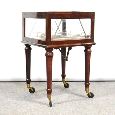 Lot 437 - Walnut metamorphic cocktail cabinet