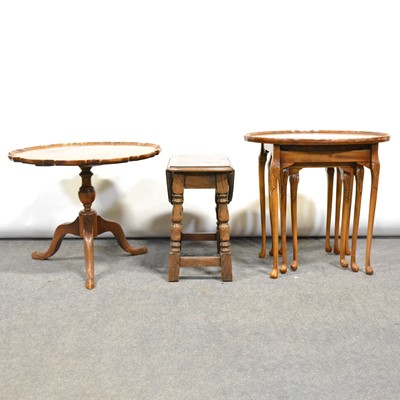 Lot 454 - mahogany and beechwood pedestal coffee table, nest of tables and dropleaf table