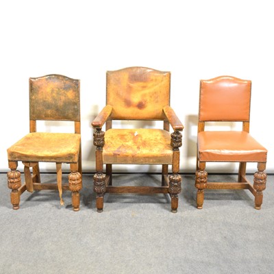 Lot 498 - Harlequin set of eleven leather upholstered oak dining chairs