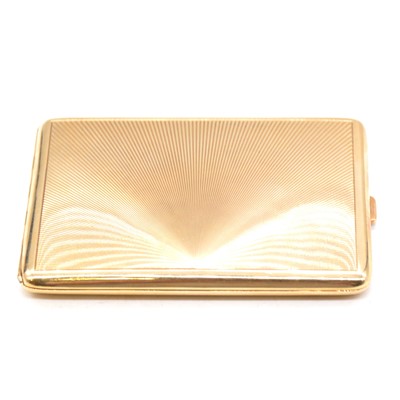 Lot 111 - A 9 carat yellow gold engine turned cigarette case.