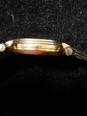 Lot 363 - Must de Cartier - a lady's gold-plated wristwatch.
