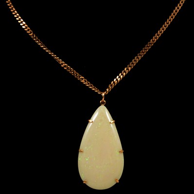 Lot 185 - An opal pendant and chain.